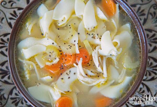 A steaming bowl of  homemade Chicken Noodle Soup.