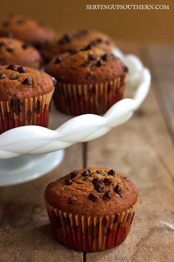 Pumpkin chocolate chips muffins on a cake stand