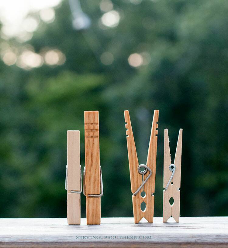 Hang pictures with fishing line and clothes pins!