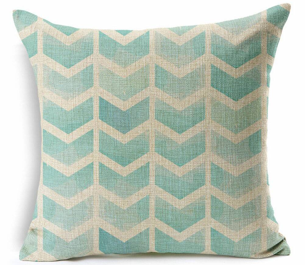 Coastal decorative pillow covers with aqua tones.