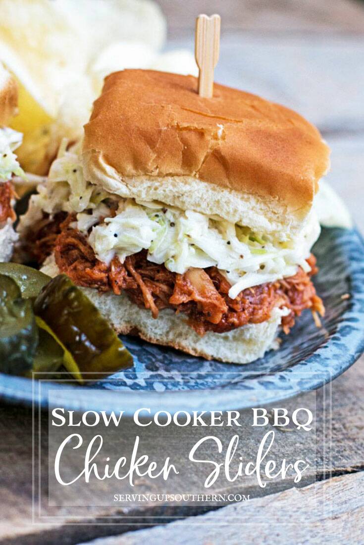 Pinterest graphic of Slow Cooker BBQ Chicken Sliders on a tin pie plate with pickles and chips.