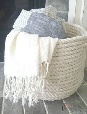 Homemade basket made from white roping.
