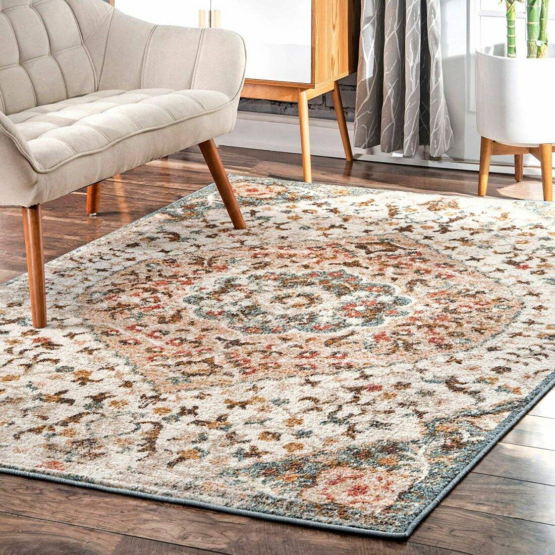 Picture of vintage style rug in a living room.